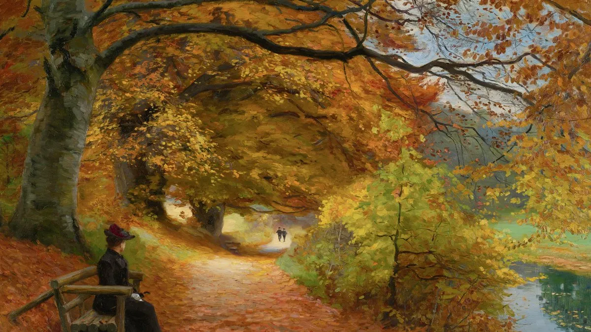 A woman in a dark dress and hat sits on a bench beneath a great beech tree, watching two figures walk away down a leaf-strewn autumn path — Hans Andersen Brendekilde's A Wooded Path in Autumn.